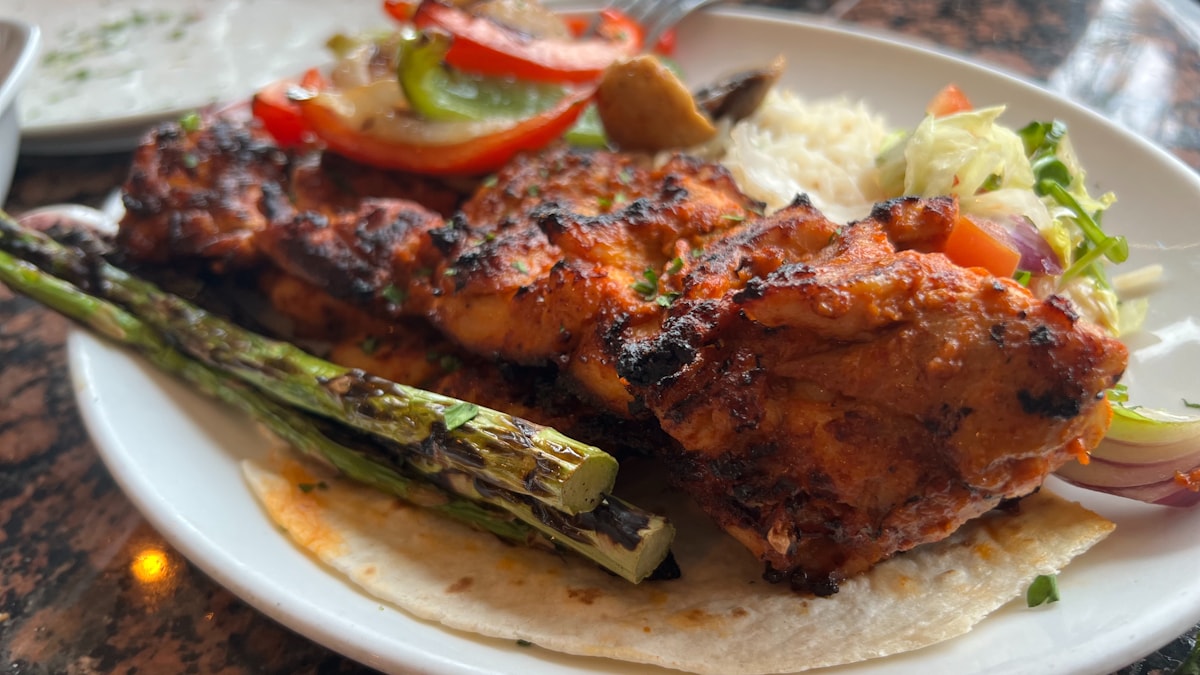 Grilled peri-peri chicken with sides